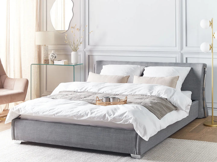 Upholstered waterbed with grey fabric finish