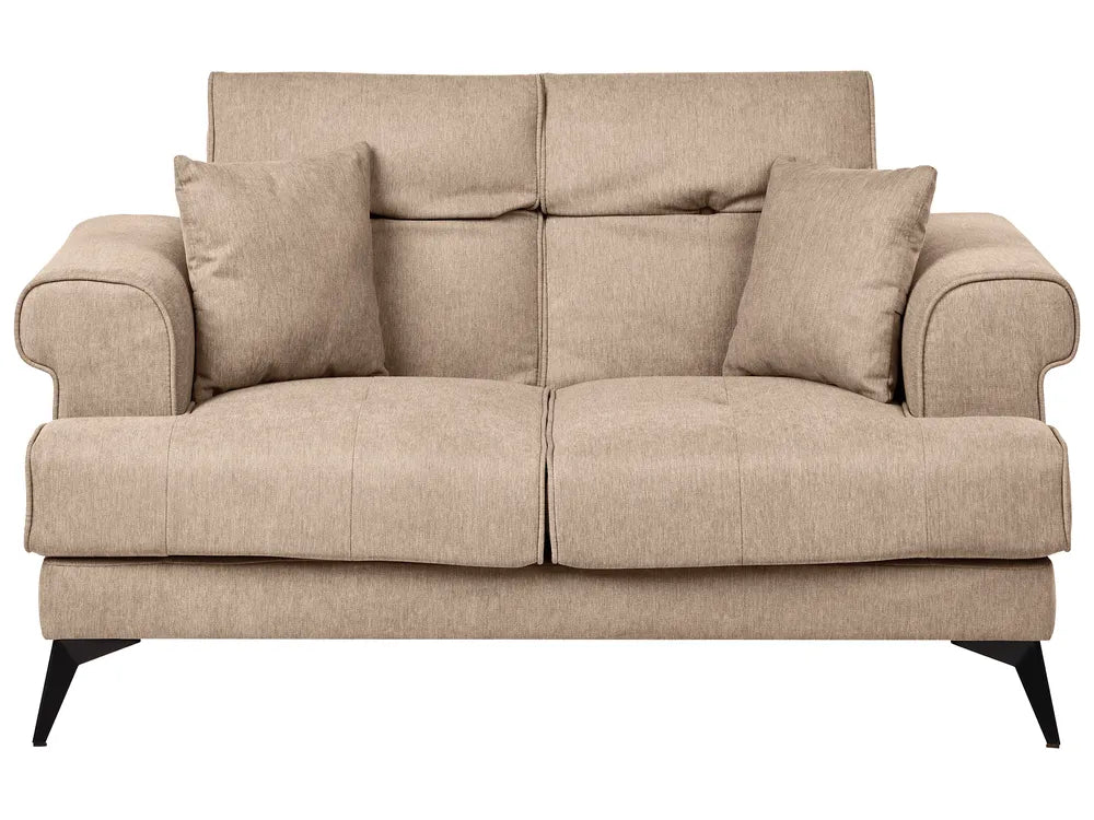 Beige sofa with three cushions on a white background