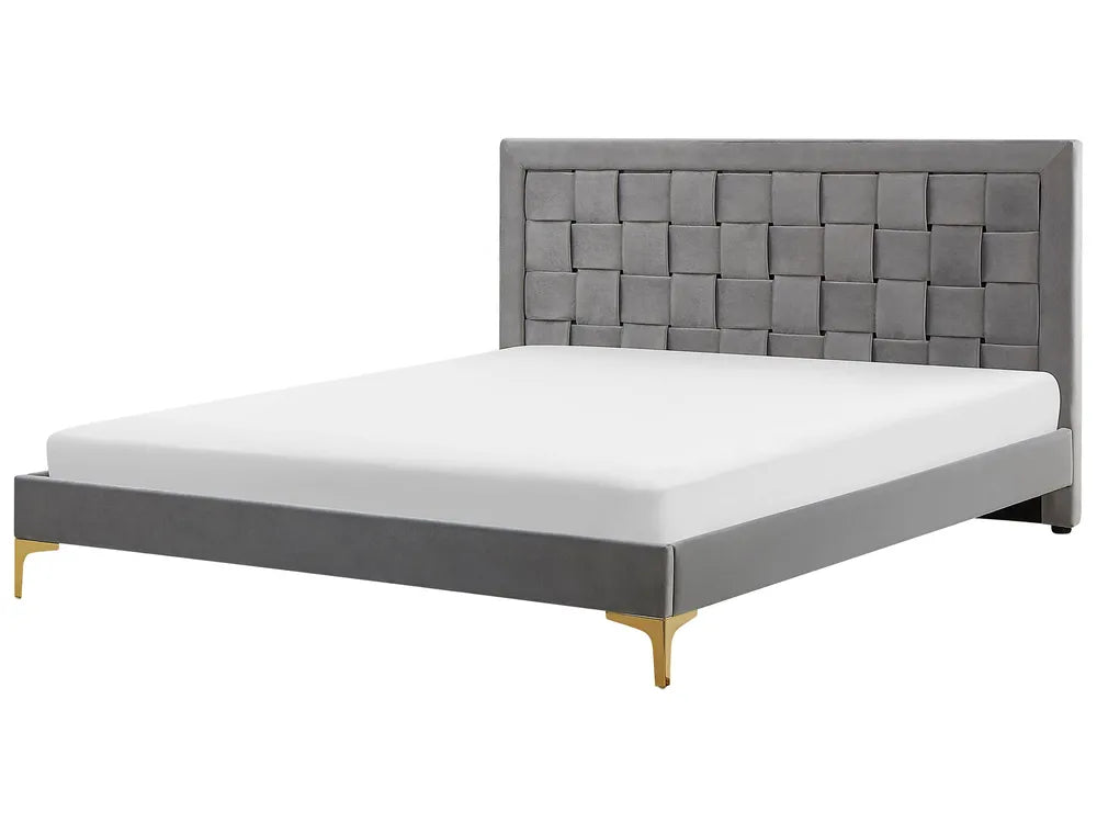 Grey velvet super king bed with upholstered headboard