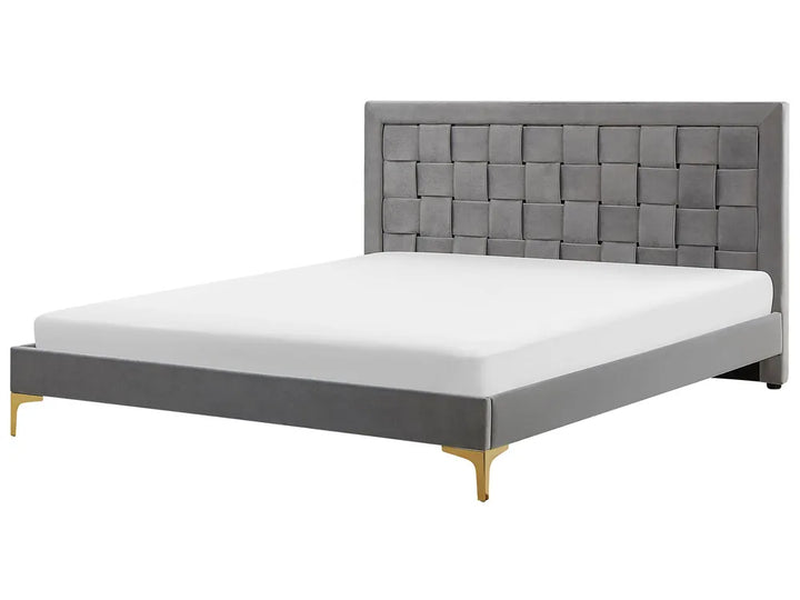 Grey velvet super king bed with upholstered headboard