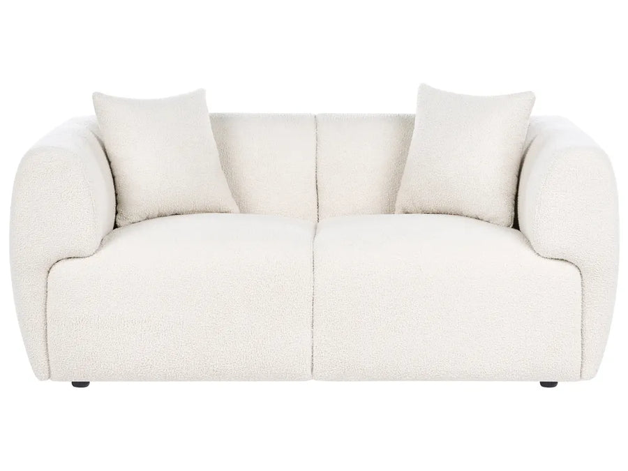 White sofa with two cushions on a white background