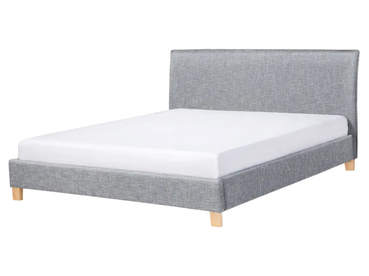 Light grey fabric king size bed with padded headboard