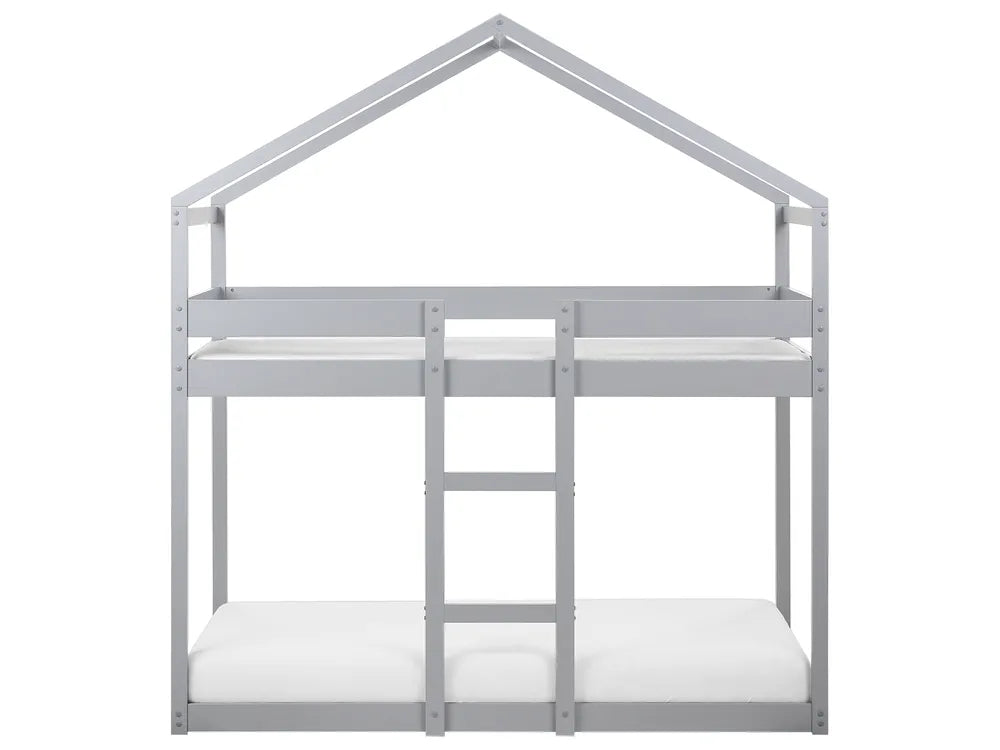 Children's house-shaped bed with white mattress on a white background
