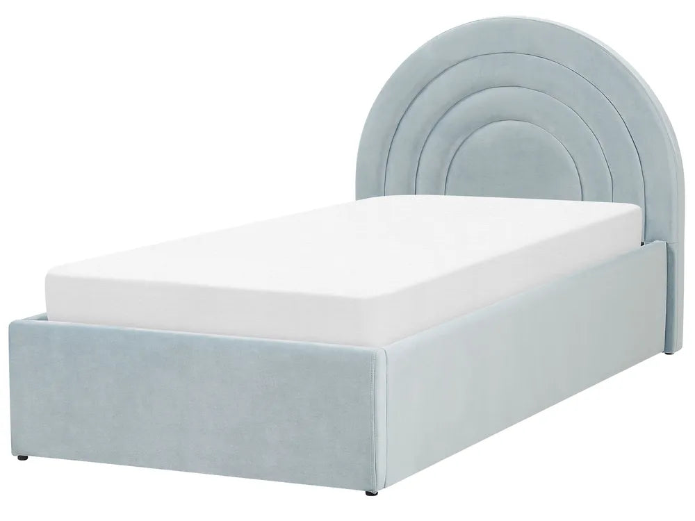 Light blue bed with curved headboard on a white background