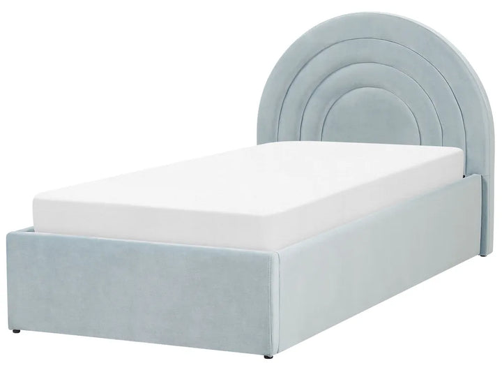Light blue bed with curved headboard on a white background