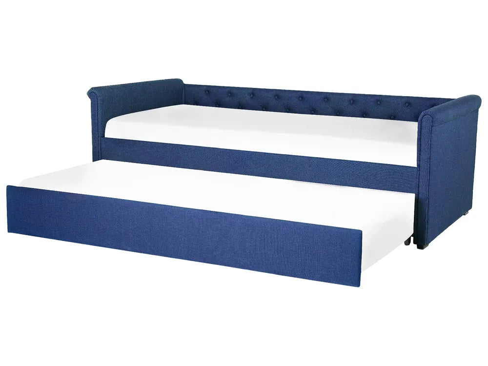 Blue upholstered bed with white mattress on a white background