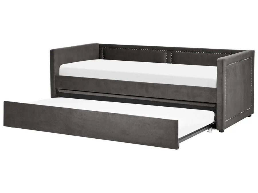 Gray upholstered bed with a white mattress on a white background