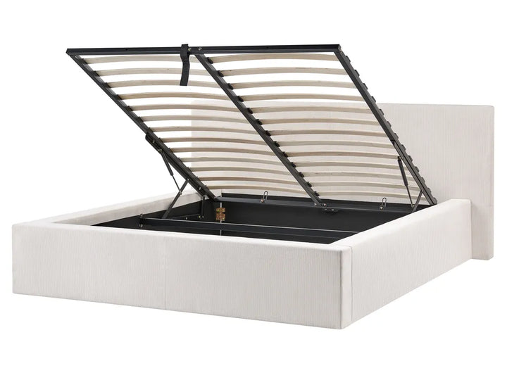 White bed frame with an open storage compartment on a white background