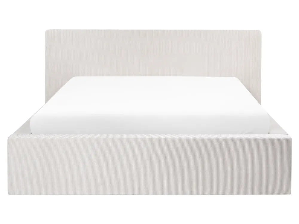 White bed frame with white mattress on a white background