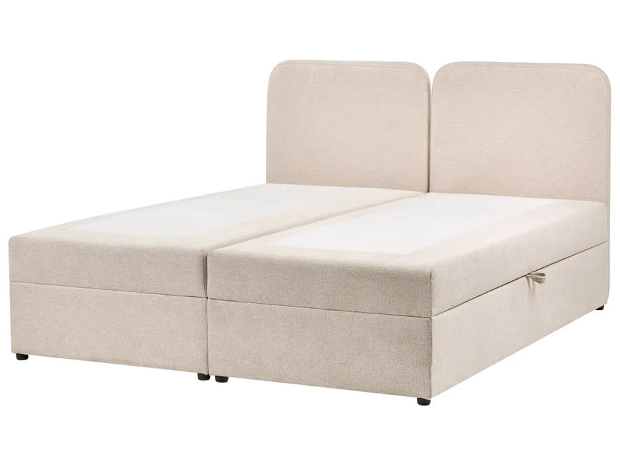Beige upholstered bed with storage drawers on a white background