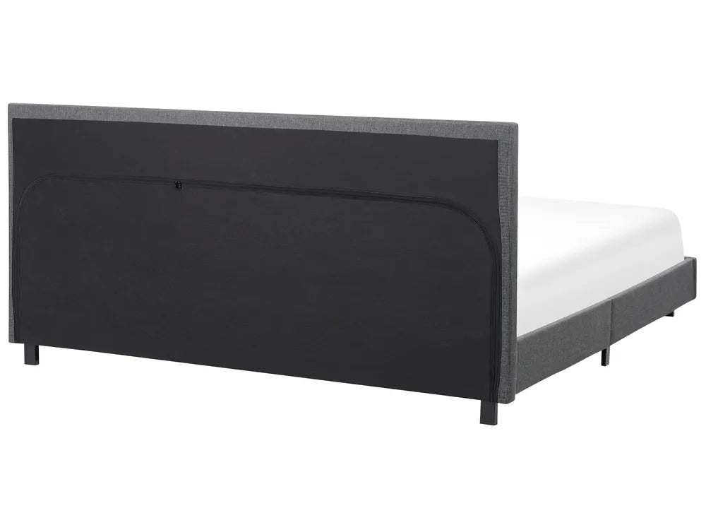 Black bed frame with white mattress on a white background