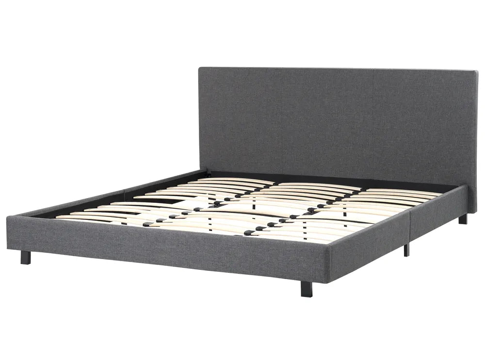 Gray upholstered bed frame on a white background