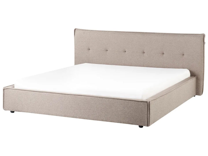 Beige upholstered bed with white mattress on a white background