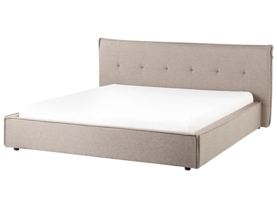 Beige upholstered bed with white mattress on a white background
