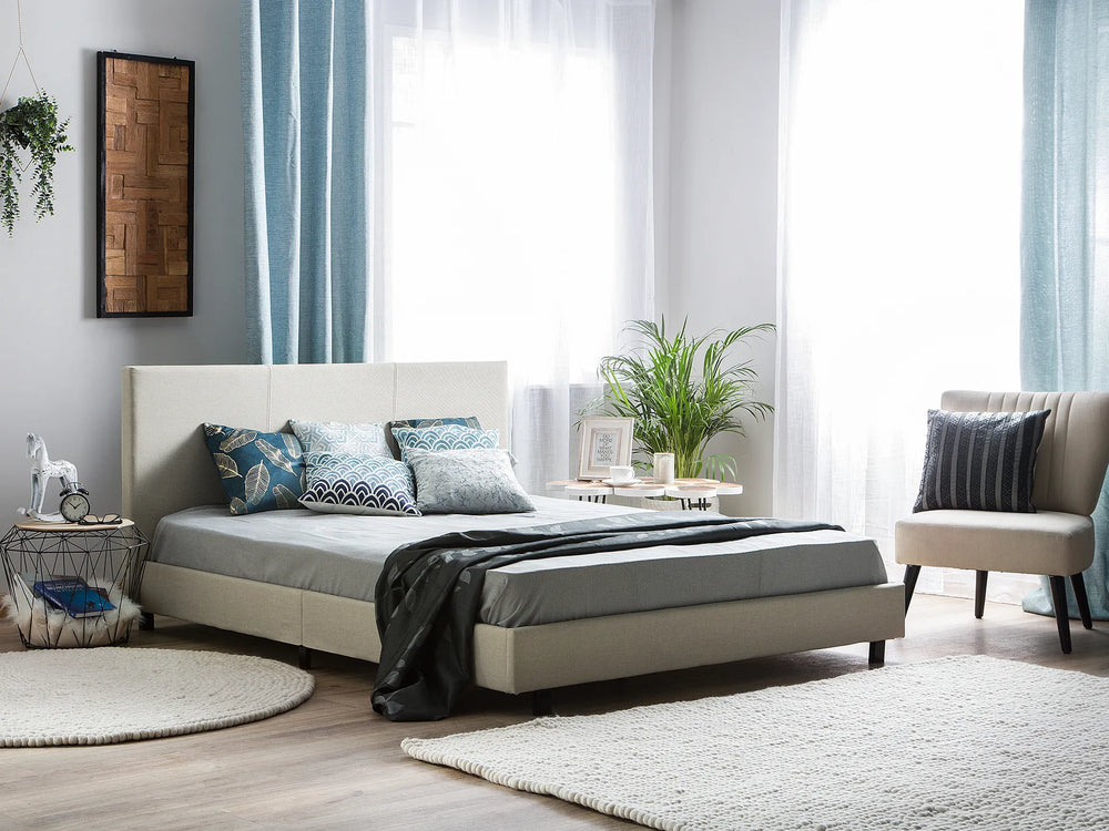 Beige upholstered fabric waterbed frame