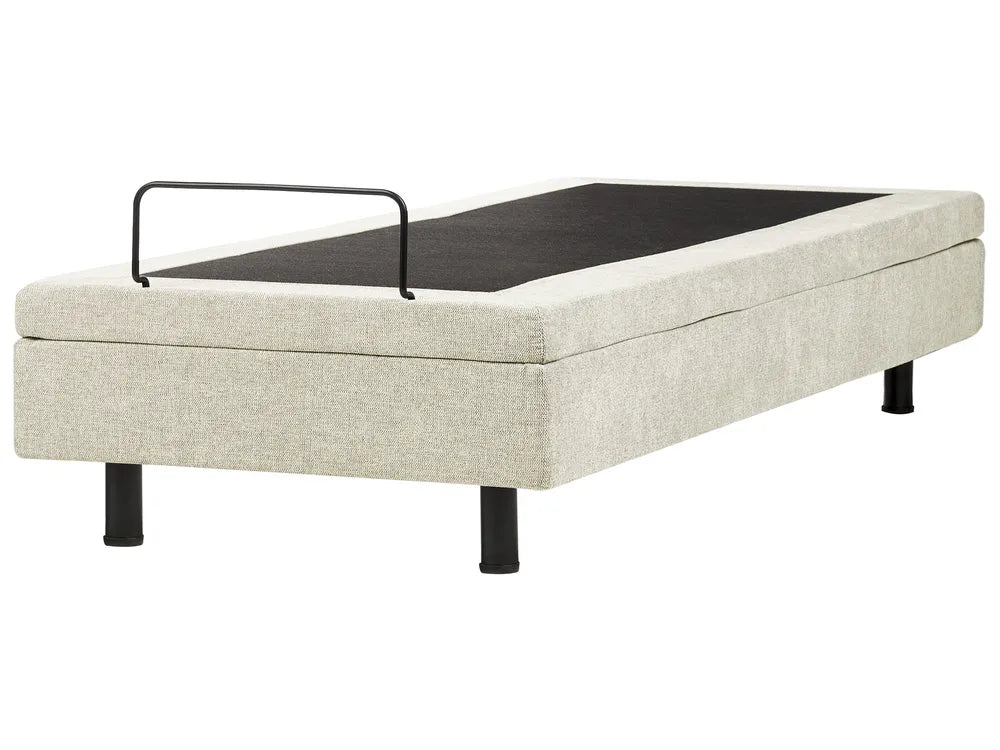 Beige storage ottoman with a black tray on a white background