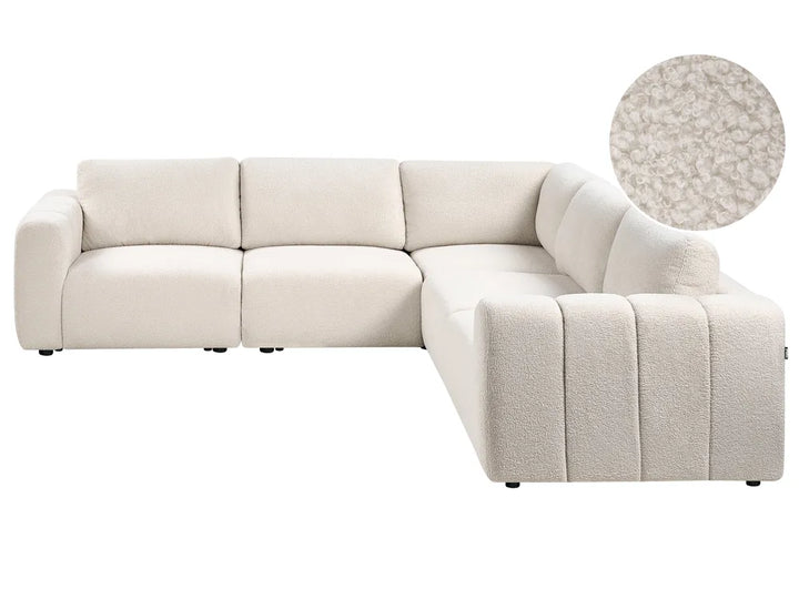 Beige sectional sofa with a close-up of the fabric texture on a white background
