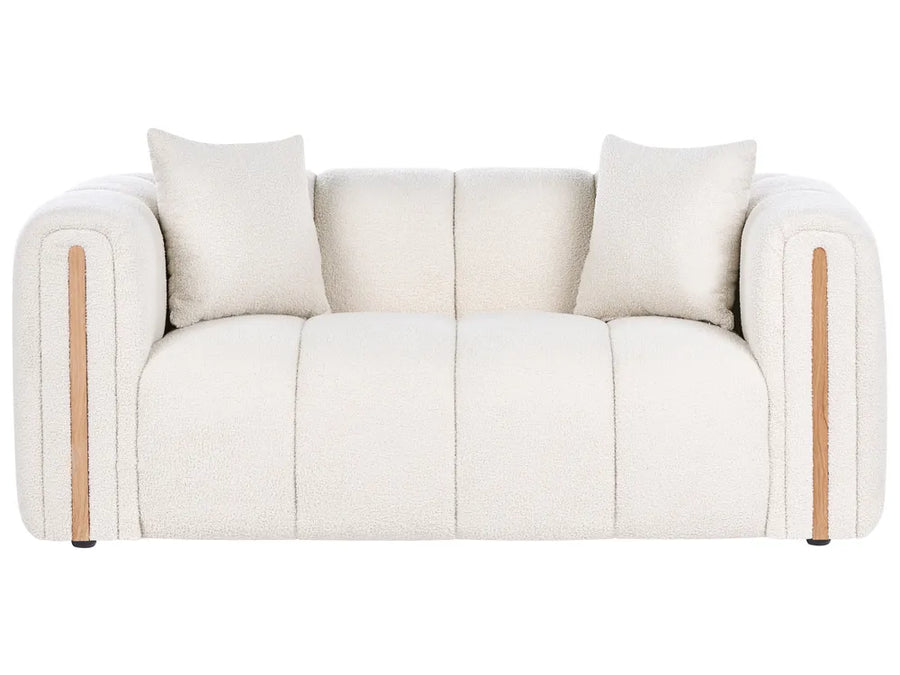 White sofa with wooden armrests on a white background
