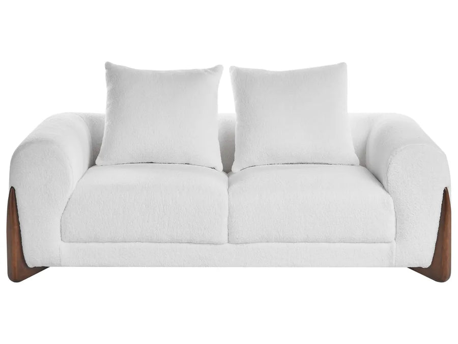 White sofa with wooden armrests on a white background