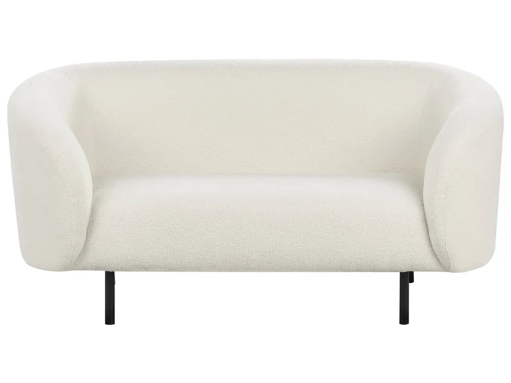 Beige sofa with black legs on a white background