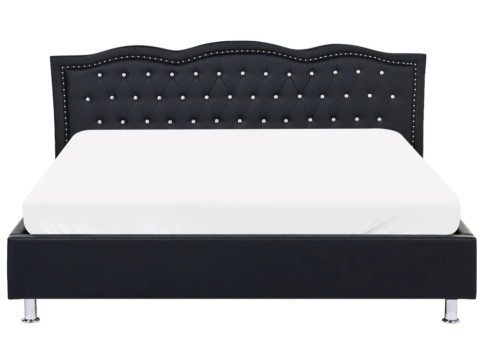 Upholstered bed with silver button detailing