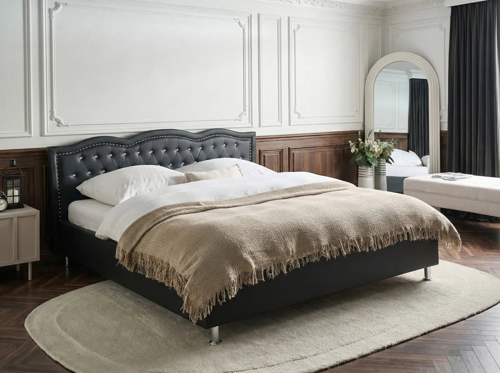 Black faux leather super king bed with tufted headboard