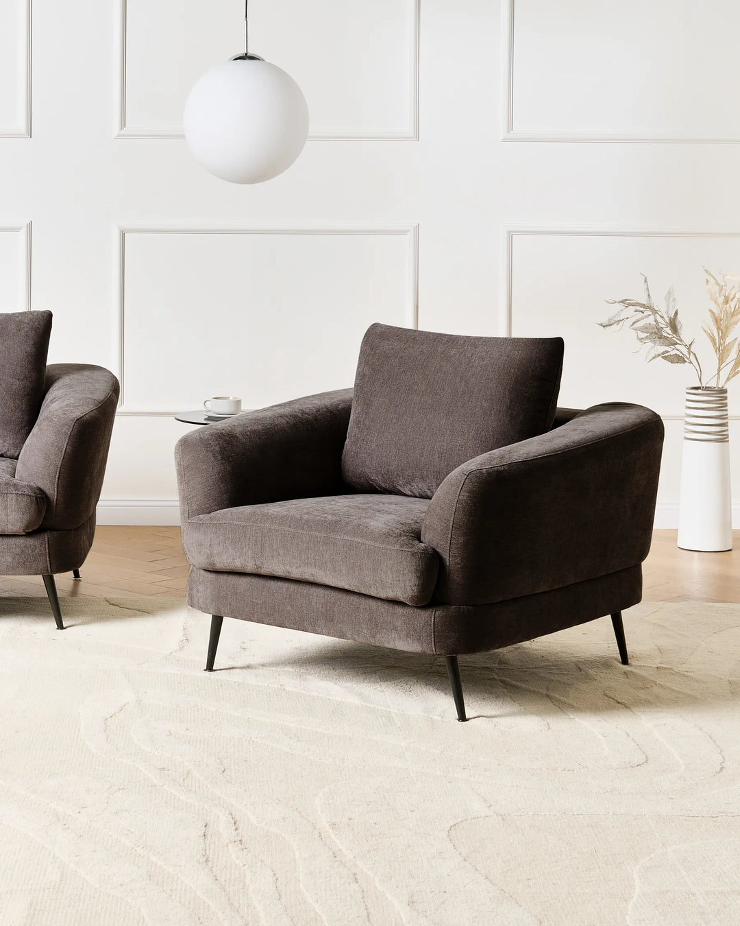 A refined seating solution crafted in sumptuous taupe chenille.