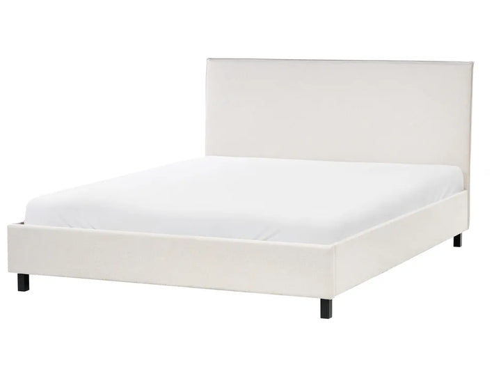 Beige fabric king size bed with padded headboard