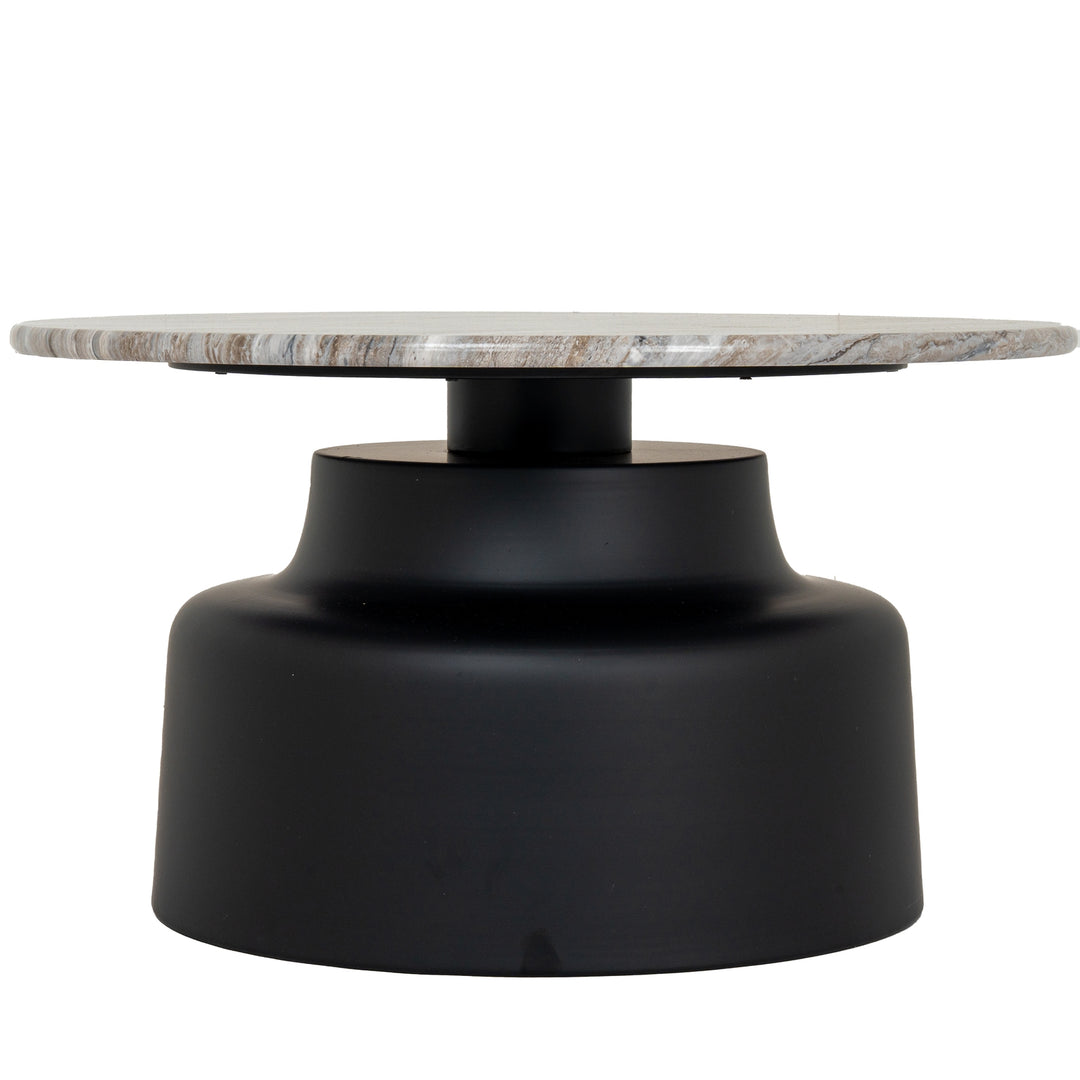 Round coffee table with marble top and black base on a white background