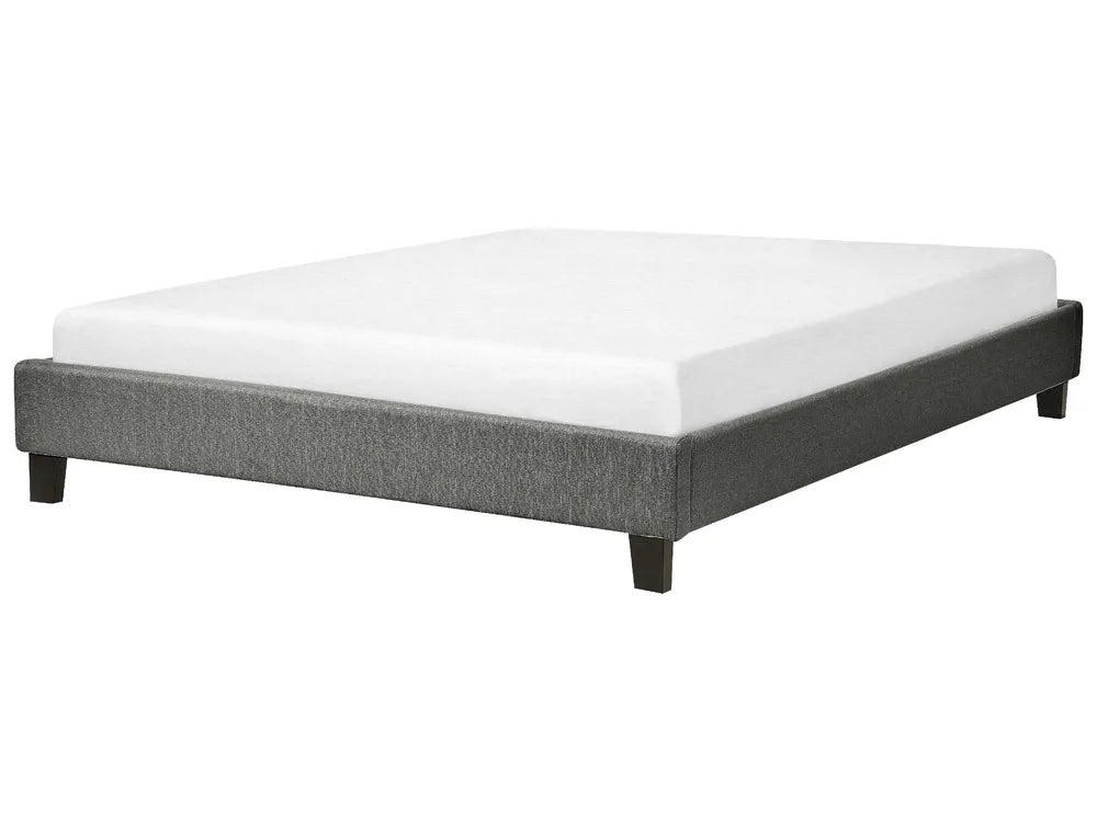 Gray bed frame with white mattress on a white background