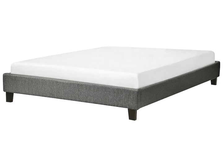 Gray bed frame with white mattress on a white background