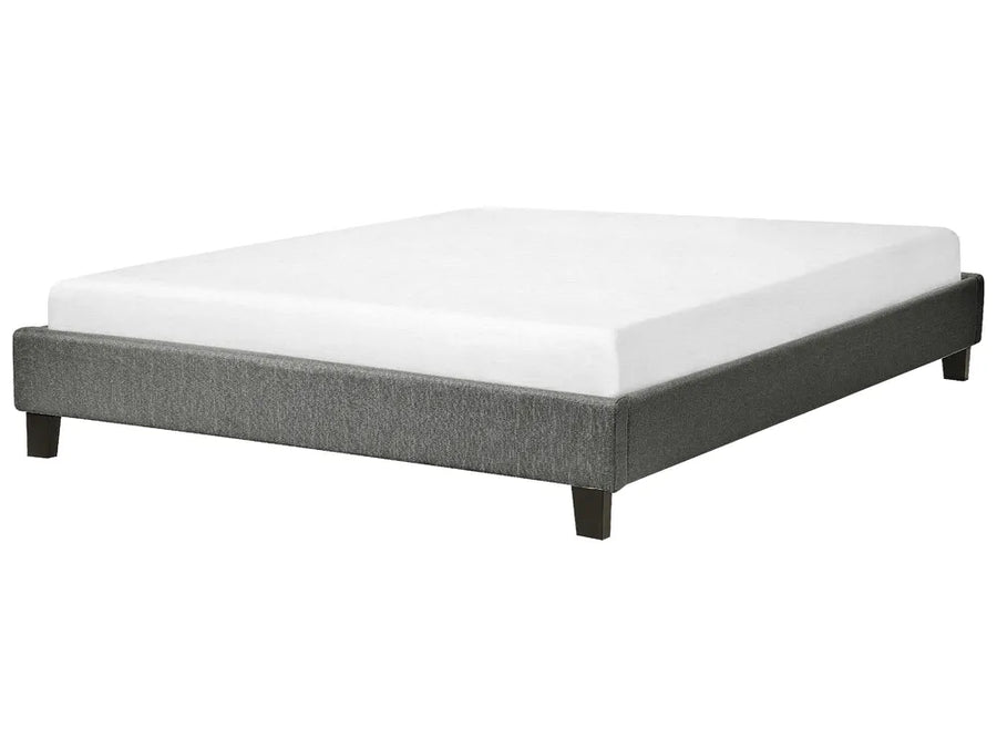 Gray bed frame with white mattress on a white background