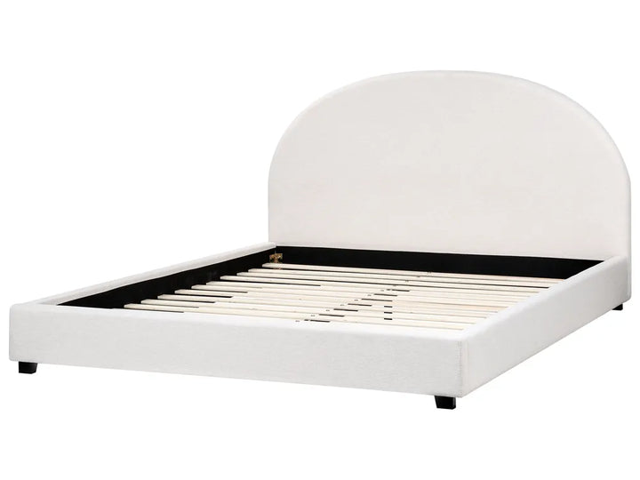 White bed frame with rounded headboard on a white background