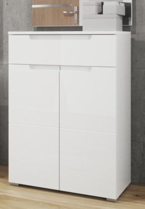 White cabinet with wooden top in a bathroom setting