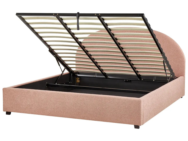 Pink bed frame with black metal slat support on a white background