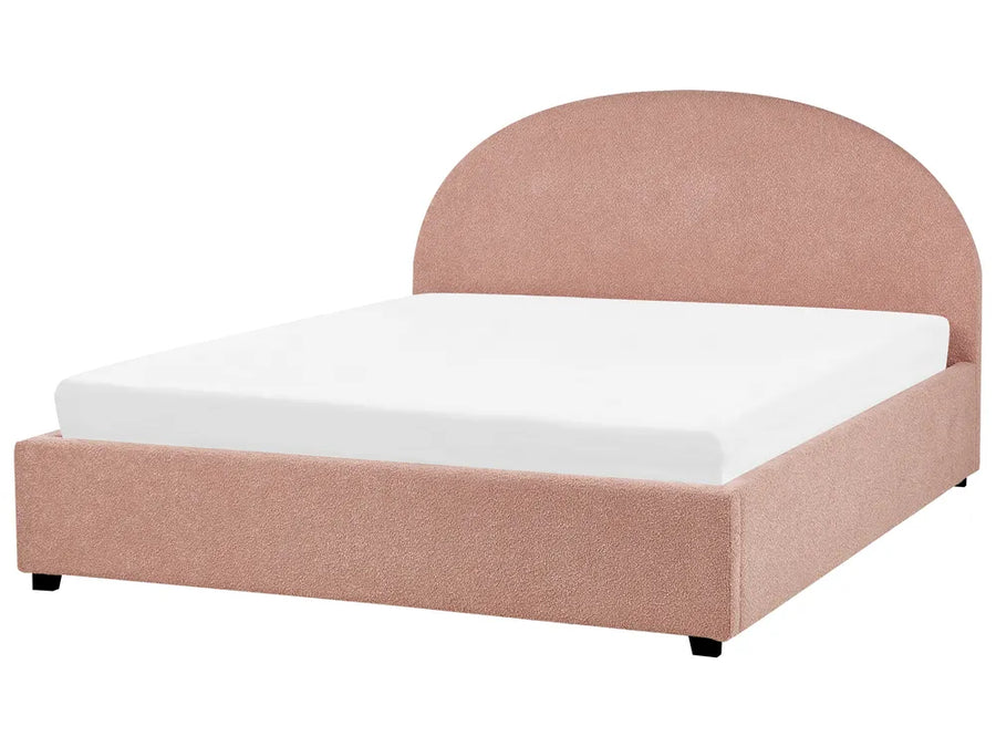 Pastel pink bouclé waterbed with curved headboard