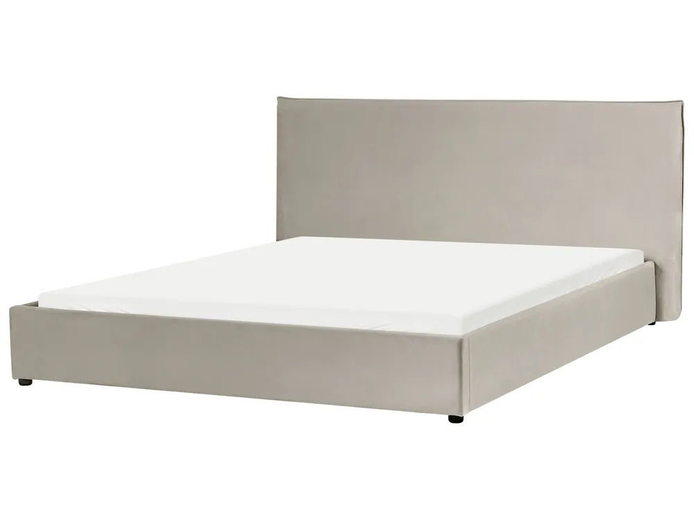 Beige upholstered bed with white mattress on a white background