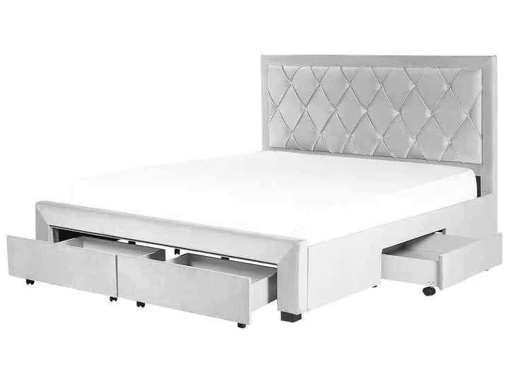 White bed with diamond-patterned headboard and storage drawers on a white background