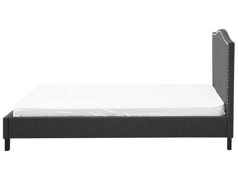 Black bed frame with white mattress on a white background