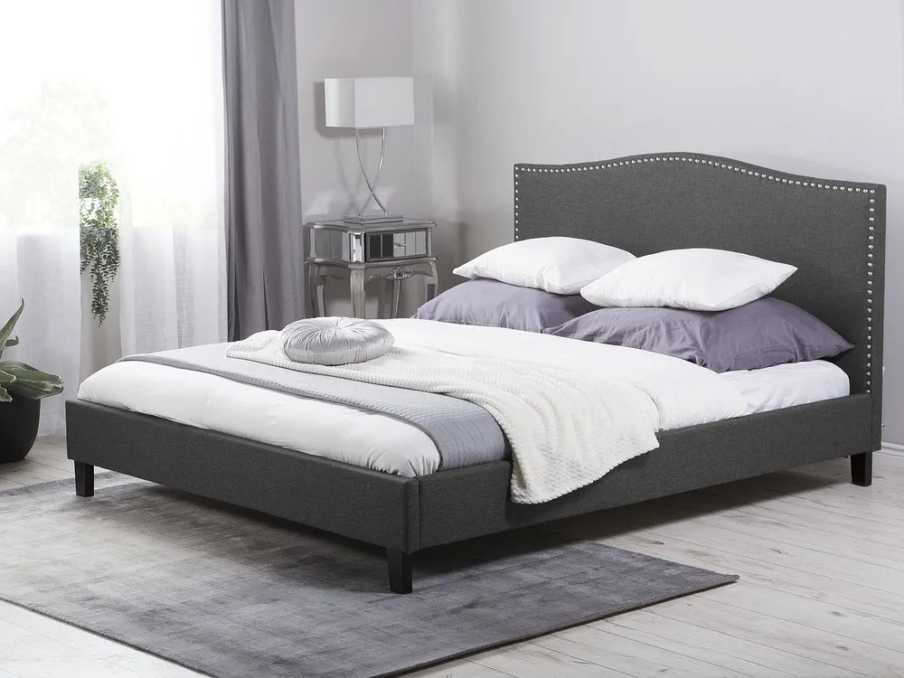 Modern white fabric bed with ambient LED lighting