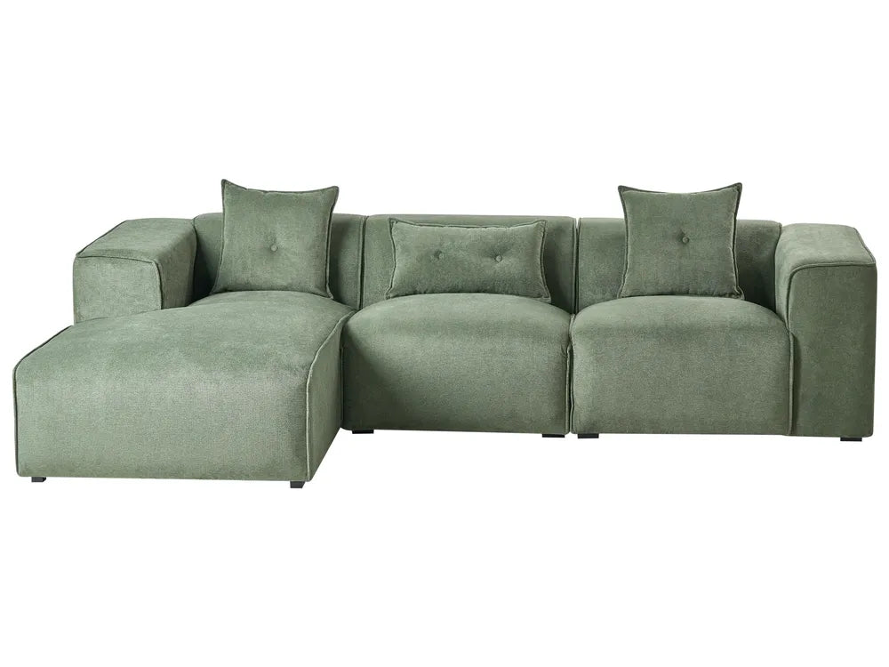 Green sectional sofa with cushions on a white background