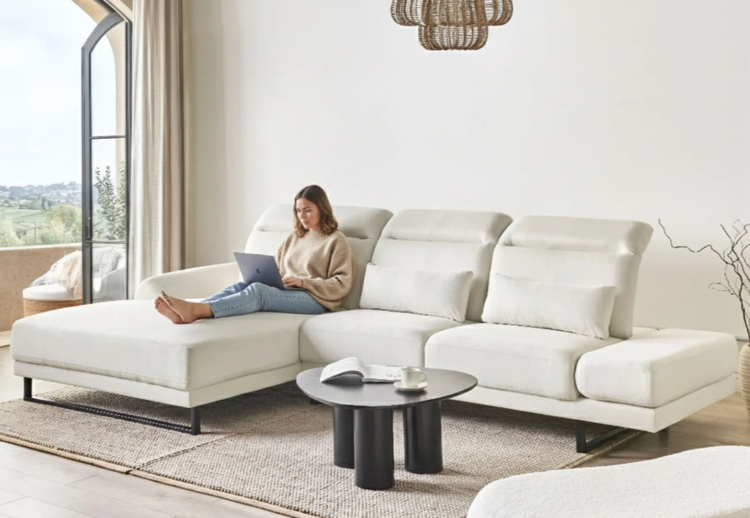 Modern off-white L-shape fabric corner sofa in living room