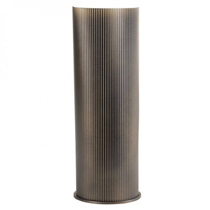 Cylindrical decorative object with ribbed texture on a white background
