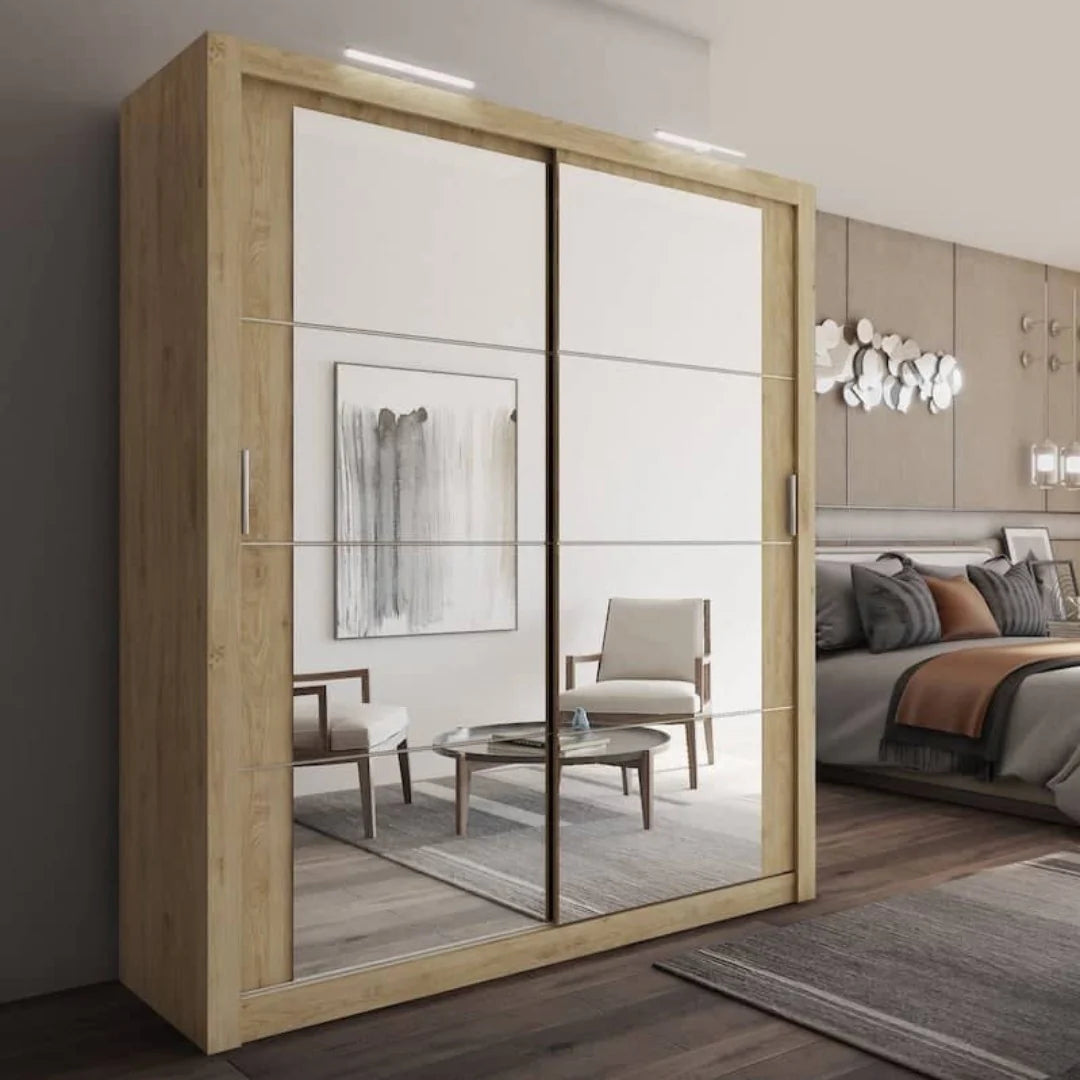 Wooden wardrobe with sliding mirror doors in a bedroom setting