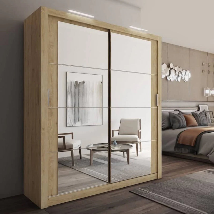Wooden wardrobe with sliding mirror doors in a bedroom setting
