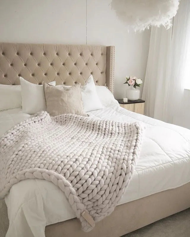 Elegant velvet bed with wingback style headboard