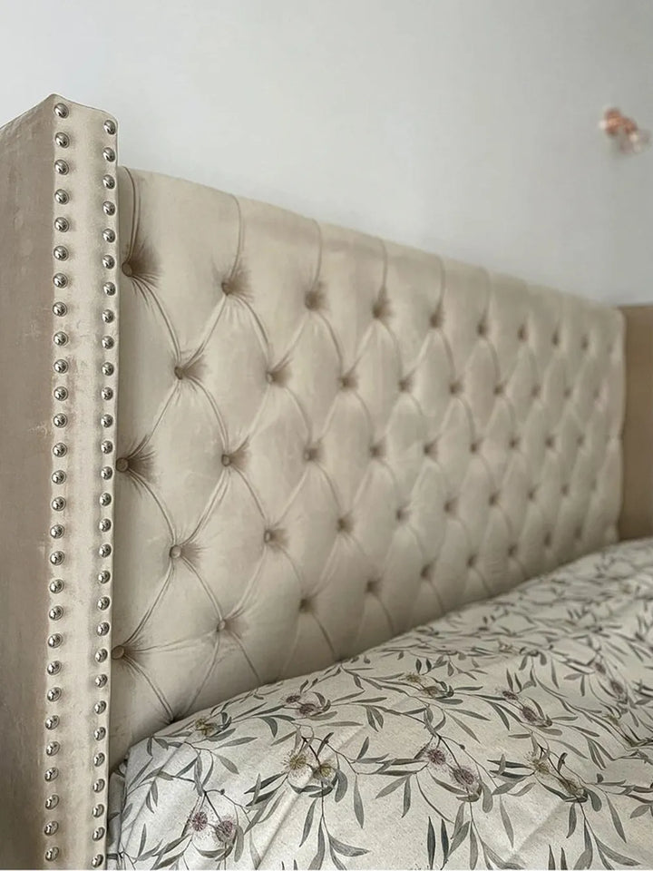 Modern beige velvet bed with slatted base