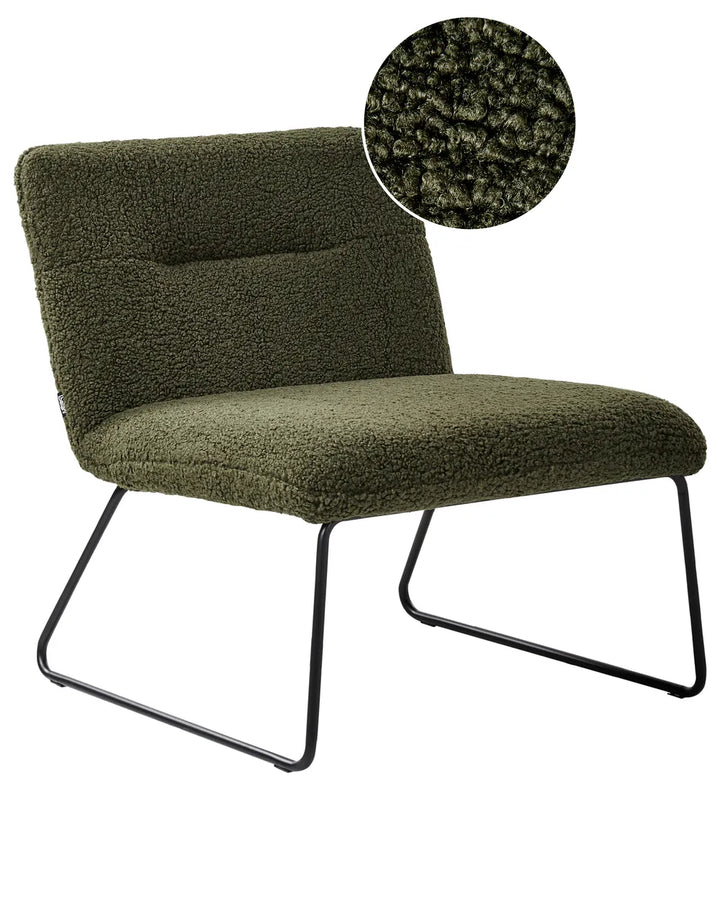 Green armchair with textured surface and black metal legs on a white background