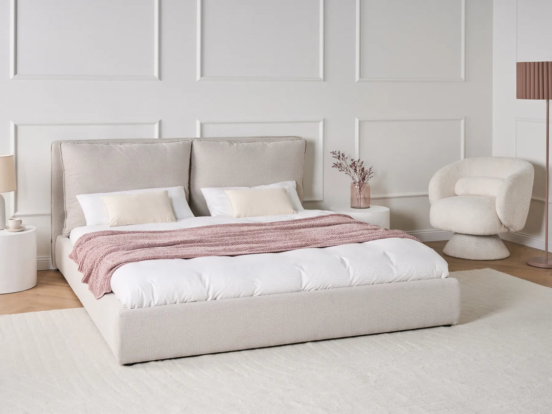 beige upholstered bed frame