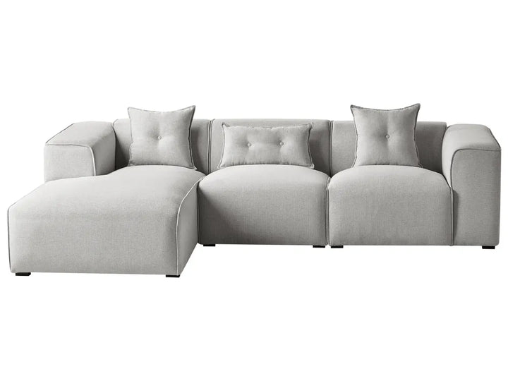Beige sectional sofa on a white background
